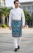 Man wearing a traditional outfit Premium teal blue instant sampin kasturi with elegant traditional Malay design setting.