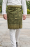 Person wearing a Sampin Instant Kasturi traditional Olive green Gold outdoor background