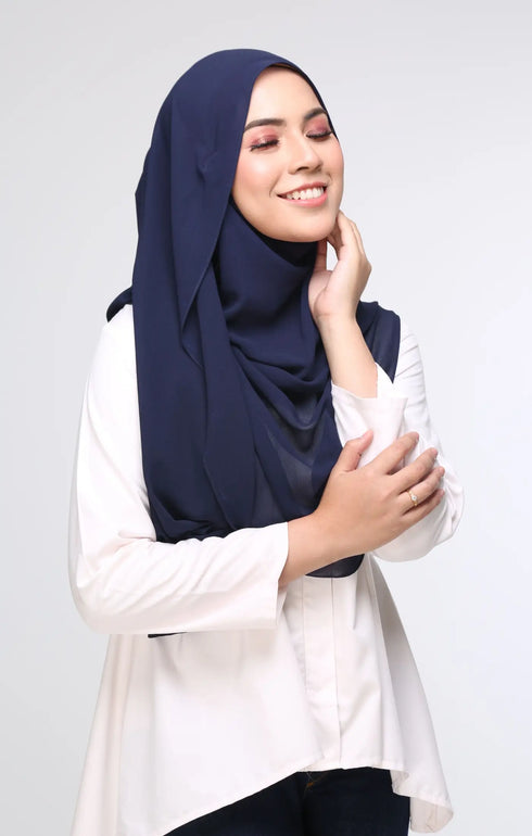 Woman wearing a Blue Black Semi Instant Shawl Plain styling shot showing shawl wrapped on model