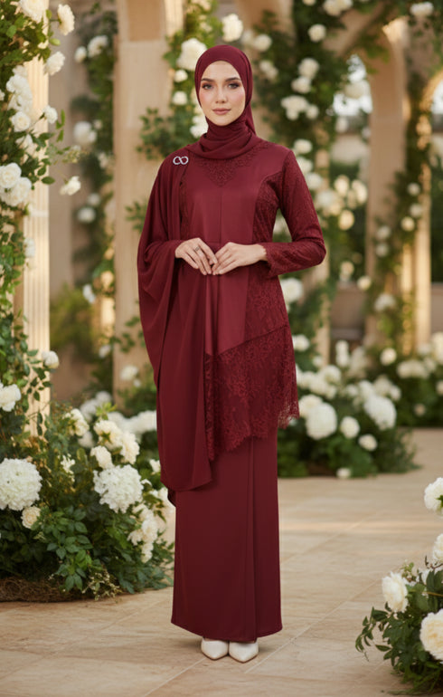 Woman in a Kebaya Moden Maroon flat lay showing full traditional kebaya garment design dress standing in a decorated outdoor setting with flowers.