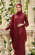 Woman in a Kebaya Moden Maroon front view dress with French lace and soft cotton fabric texture details standing on a balcony with floral decorations.