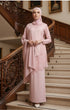 Kebaya Moden Rose Gold flat lay showing full kebaya dress shape standing on a staircase with decorative railings.