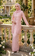 Woman in a kebaya Kutu Baru Rose Gold front view with comfortable fit and long sleeve design outfit standing on a stone balcony with floral decorations.