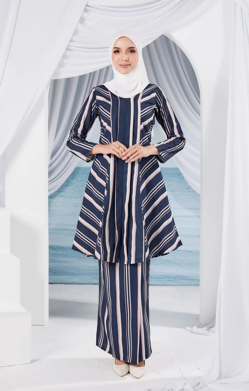 Model wearing Liyana 2.0 Kebarung Linen Blue Black Stripe displaying overall drape and styling