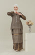 Model wearing C Luxe Kurung Kedah Black displaying overall drape and styling