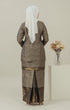 Back view C Luxe Kurung Kedah Black highlighting back zip and two-layer skirt detail