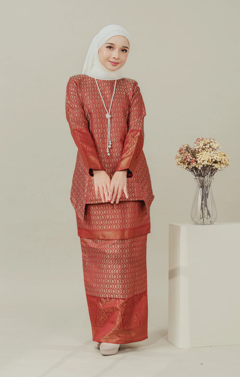 Model wearing C Luxe Kurung Kedah Maroon displaying overall styling and drape