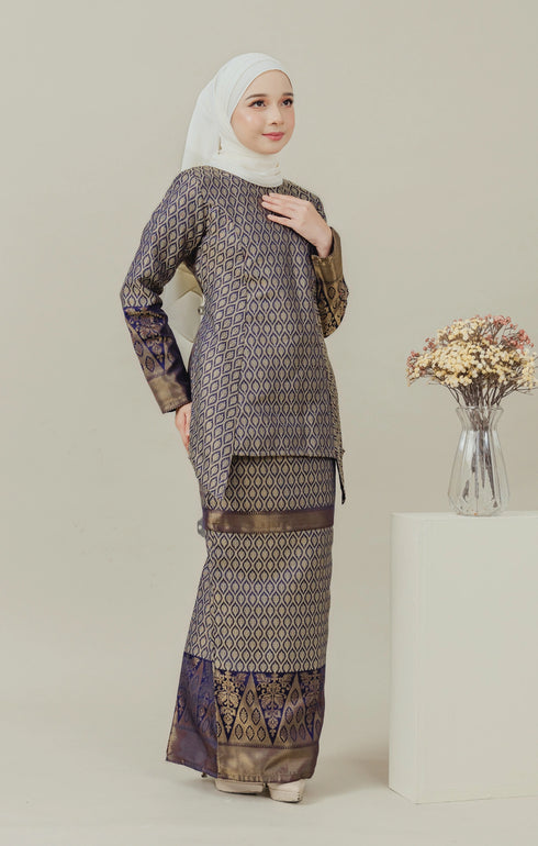 Model wearing C Luxe Kurung Kedah Navy Blue displaying overall styling and drape