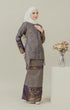 Model wearing C Luxe Kurung Kedah Navy Blue displaying overall styling and drape