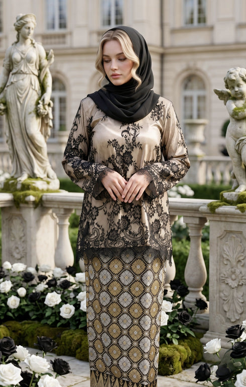 woman standing in Kurung Kedah Lace Songket Black displaying shoulder pad detail and elegant fit
