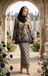 model walking in Kurung Kedah Lace Songket Black showing classic Kedah silhouette