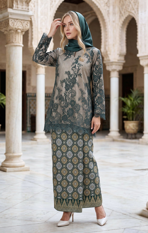 woman wearing Kurung Kedah Lace Songket Emerald Green full outfit with full songket skirt