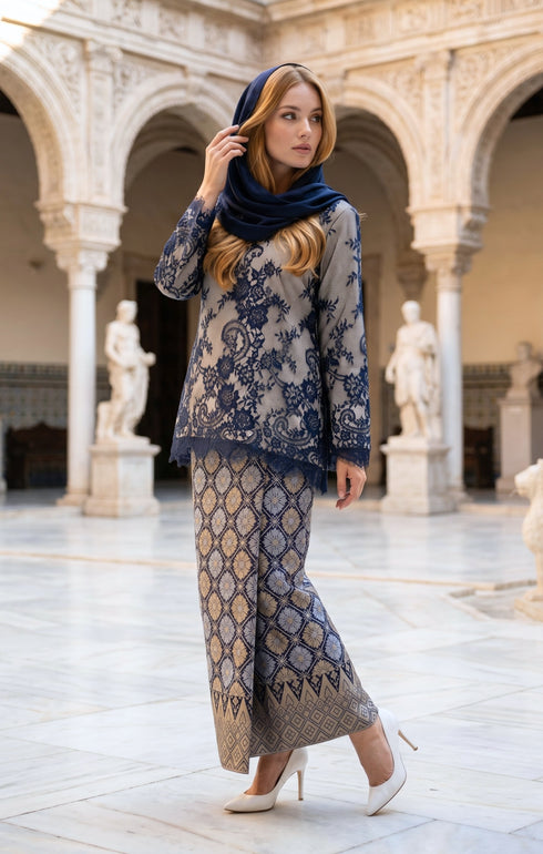 woman posing in Kurung Kedah Lace Songket Blue Black featuring full songket skirt styling