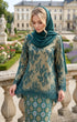 model wearing Kurung Kedah Lace Songket Teal Green close-up French lace and songket texture