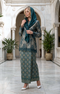 model wearing Kurung Kedah Lace Songket Teal Green side view showing classic Kedah silhouette