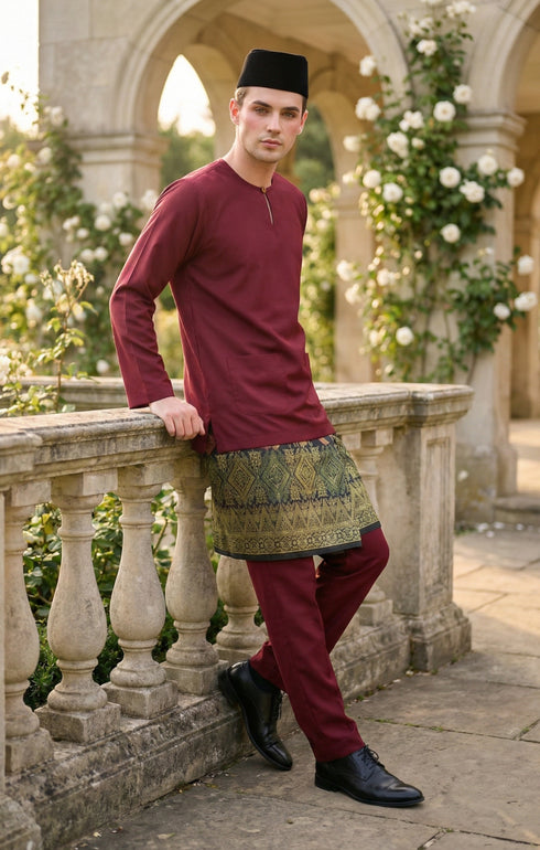 Baju Melayu Teluk Belanga Maroon side view showing sleeve and fit in the background in an outdoor setting.