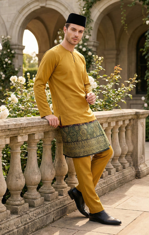 Man wearing Baju Melayu Teluk Belanga Mustard traditional attire with a sampin 3d, outdoor standing on a stone balcony with floral background