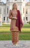 woman wearing Kurung Moden Dyed Brocade Burgundy front view showcasing round neck and elegant silhouette