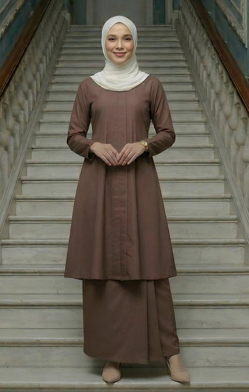 Woman Kebarung Klasik Plain Chocolate full outfit view standing on a staircase