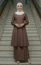 Woman Kebarung Klasik Plain Chocolate full outfit view standing on a staircase