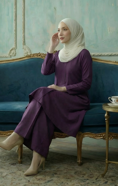 Kebarung Klasik Plain Dark Purple front view model wearing V neck labuh design sitting on sofa