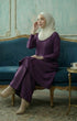 Kebarung Klasik Plain Dark Purple front view model wearing V neck labuh design sitting on sofa