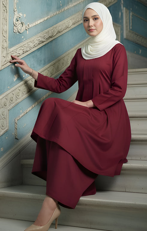 Kebarung Klasik Plain Maroon close-up cotton fabric sitting on a staircase with decorative walls.