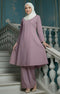 Kebarung Klasik Smokey Purple front view with V neck and labuh design with a blue wall background
