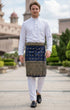 Person wearing Sampin Instant Bintang Tenun Navy Blue Gold with Baju Melayu traditional outfit front view showing full star woven pattern