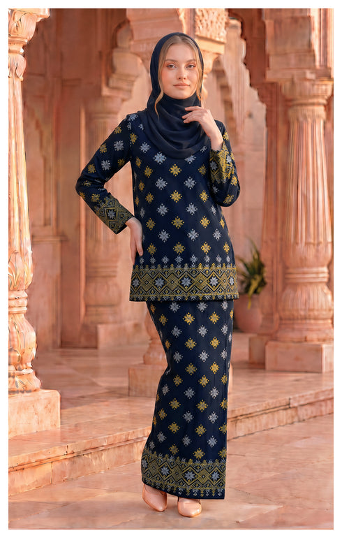 woman wearing Kurung Kedah Blue Black full view songket round neck design