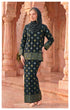 model wearing Kurung Kedah Dark Emerald Green side view showing standard fit silhouette