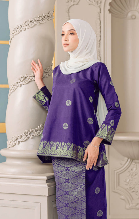 Fabric close up Kurung Kedah Purple Gold showing woven songket texture and gold highlights