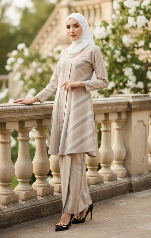 Model wearing Liyana 2.0 Kebarung Linen Dusty Peach Stripe displaying overall styling and drape