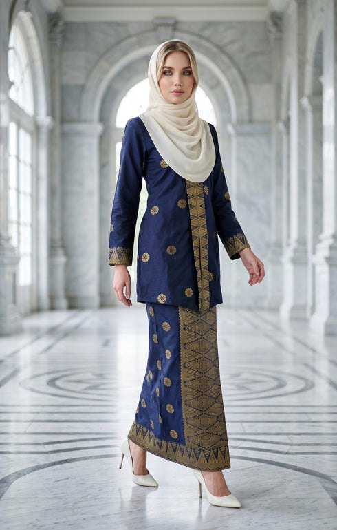 woman wearing Kebaya Kurung Moden Songket Blue Black Gold posing outdoors in full outfit