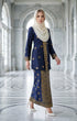 woman wearing Kebaya Kurung Moden Songket Blue Black Gold posing outdoors in full outfit