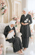 Model wearing Aruna Kebarung Linen Black Check D4‑4 displaying full drape and styling