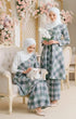 Model wearing Aruna Kebarung Linen Dusty Green Check D6-2 showing overall drape and styling