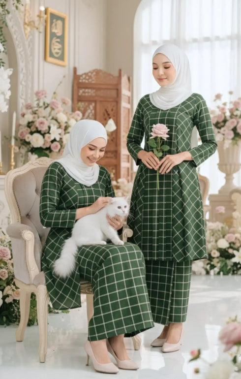Model wearing Aruna Kebarung Linen Emerald Green Check D4‑1 displaying overall drape and styling