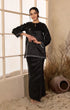 Model in black Sophia Kurung Kedah
