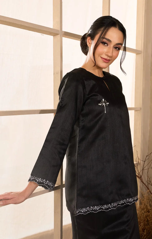 Black Kurung Kedah fabric close-up