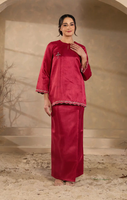 Model in maroon Sophia Kurung Kedah