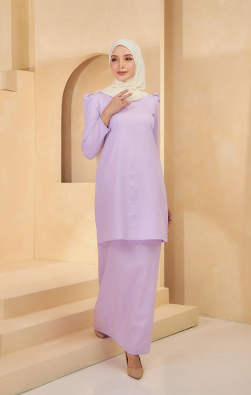 Kurung Moden Plain Dusty Purple front view on model showing round neck and puff shoulder