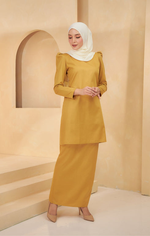 Kurung Moden Plain Mustard flat lay showing full kurung shape and plain design