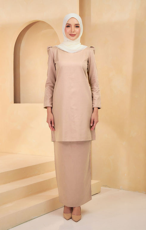 Kurung Moden Plain Nude front view on model showing round neck and puff shoulder