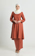 Kebarung Klasik Brick Orange on model highlighting long straight sleeves