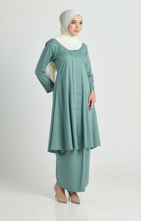 Side view Kebarung Klasik Sage Green highlighting long straight sleeve and silhouette